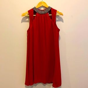 Red dress with beaded neck detail